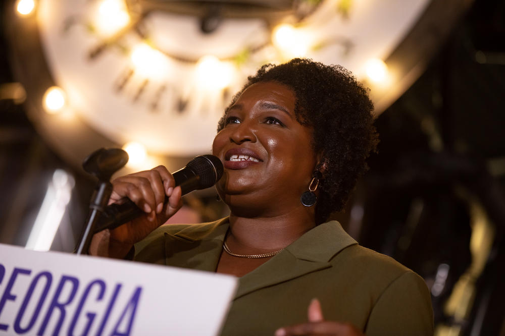 Abrams at a rally in Marietta, Ga., on Nov. 1. She has argued Georgia's $6.6 billion surplus should be used to bolster state services like affordable housing programs, schools and health care. 