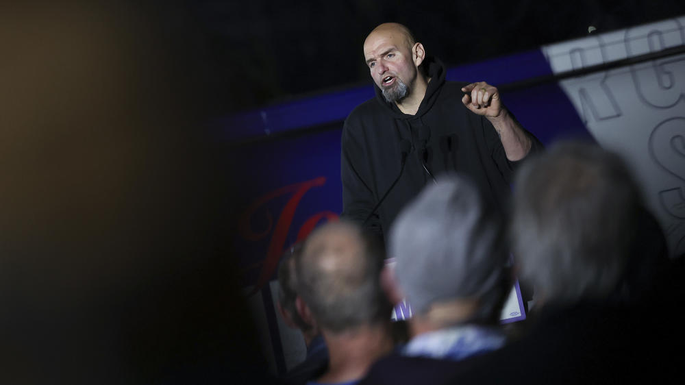Lt. Gov. John Fetterman, D-Pa., speaks during a rally in Bucks County, Pennsylvania. Fetterman faces Republican candidate Dr. Mehmet Oz in Tuesday's midterm elections.