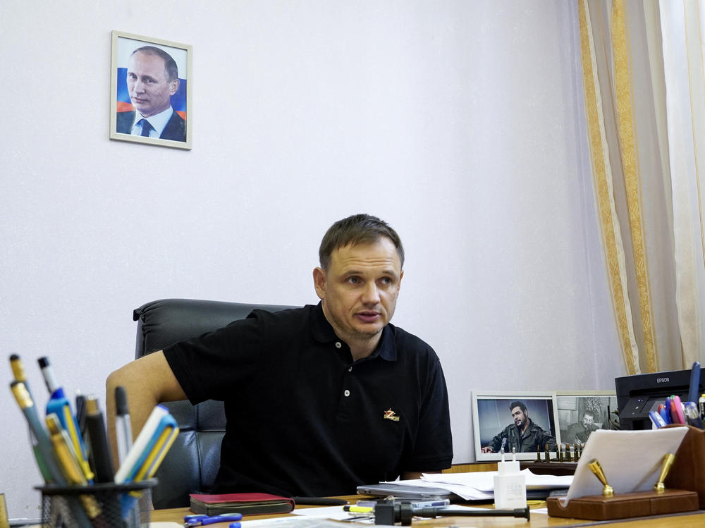 Kirill Stremousov, deputy head of the Russian-backed Kherson administration, in his office in Kherson on July 20. A portrait of Russian President Vladimir Putin is on the wall behind him.