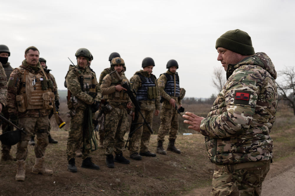 A commander from the Ukrainian 63rd brigade debriefs following a military training in Mykolaiv on Wednesday, in preparation for a counteroffensive to recapture Kherson.