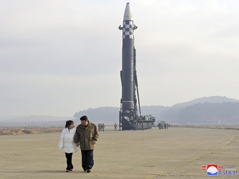 This photo provided on Nov. 19, 2022 by the North Korean government shows North Korean leader Kim Jong Un and his daughter inspect the site of a missile launch at Pyongyang International Airport in Pyongyang, North Korea, on Friday.