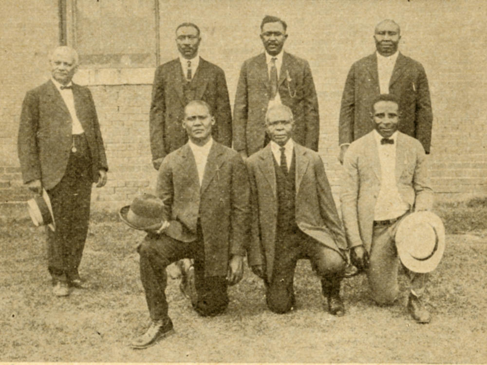 A dozen Black men were convicted<strong> </strong>of murder<strong> </strong>by all-white juries in connection with the 1919 massacre in Elaine, Ark. Above, defendants S.A. Jones, Ed Hicks, Frank Hicks, Frank Moore, J.C. Knox, Ed Coleman and Paul Hall with their attorney at the state penitentiary in Little Rock in 1925 after the Supreme Court overturned their convictions.