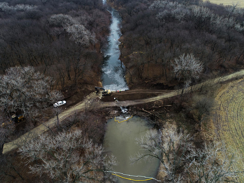 In this photo taken by a drone, cleanup continues on Dec. 9 in the area where the ruptured Keystone pipeline dumped oil into a creek in Washington County, Kan.