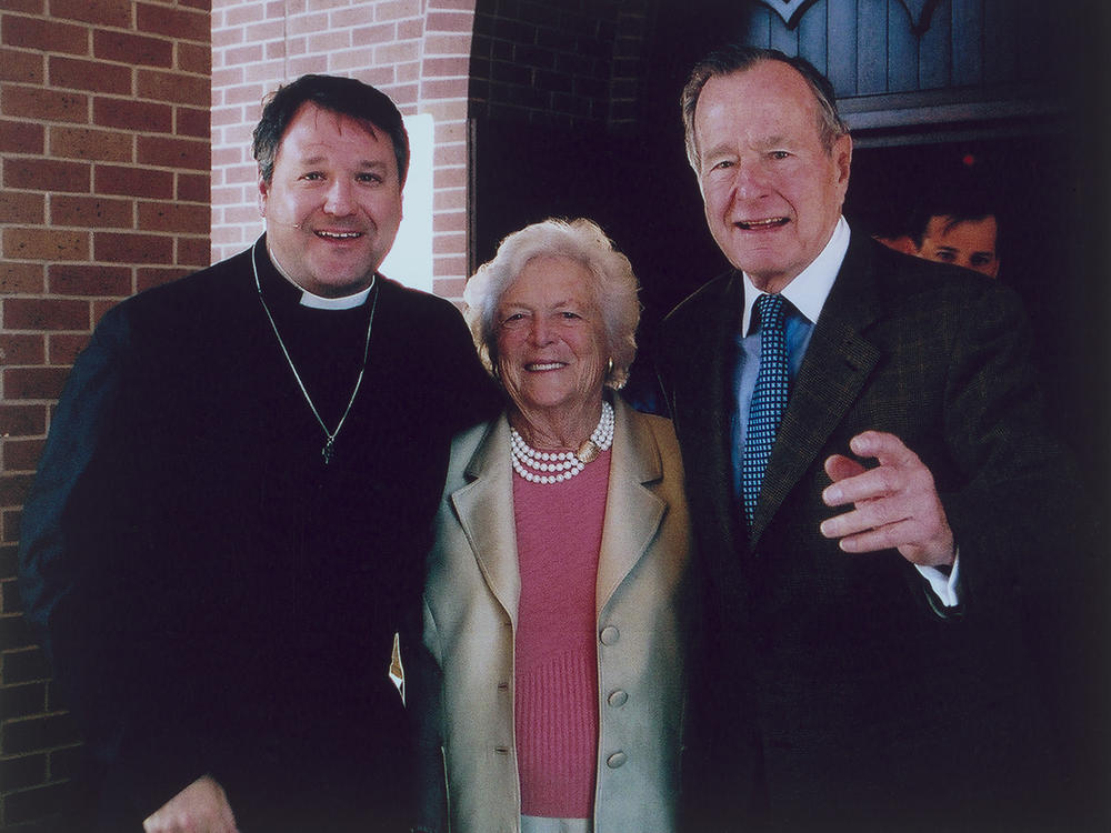 Rev. Russell Levenson, Jr. of St. Martin's Episcopal Church in Houston with former first lady Barbara Bush and former President George. H.W. Bush after a morning worship service. Levenson details his friendship with the Bushes and what he learned from them and how they lived their faith in his new book <em>Witness to Dignity: The Life and Faith of George H.W. and Barbara Bush.</em>