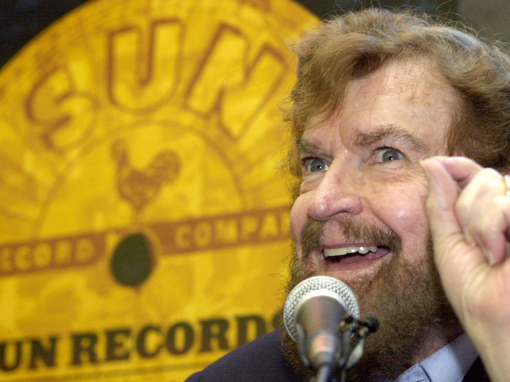 Sun Records founder Sam Phillips speaks at an event in New York City in August 2002, a year before his death.