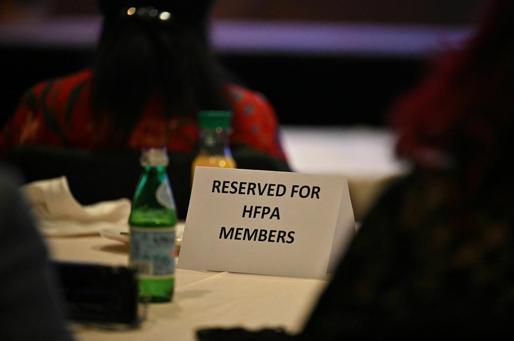 A table reserved for members of the Hollywood Foreign Press Association (HFPA) is seen at the nominations announcement for the 79th Golden Globe Awards, on Dec. 13, 2021, at the Beverly Hilton Hotel in Beverly Hills, Calif.