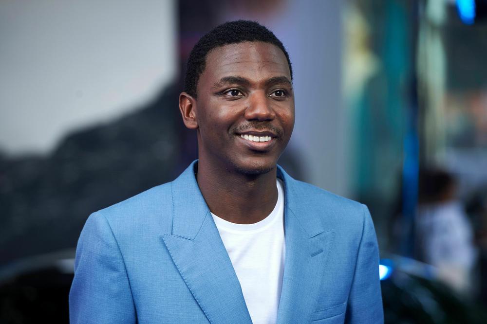 Actor and comedian Jerrod Carmichael will host the Golden Globes on Tuesday night. He's pictured above in London in June 2017.