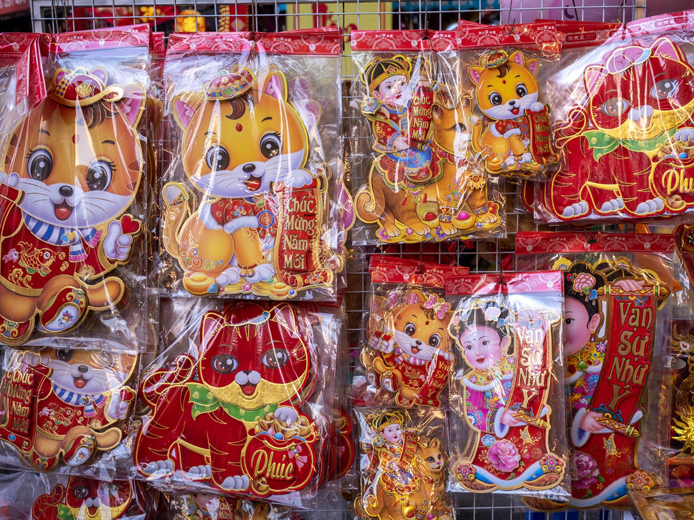 Cat stickers hang on display last week in Hanoi, Vietnam. The Lunar New Year begins on Sunday and marks the Year of the Cat in Vietnam and the Year of the Rabbit in China, South Korea and other East and Southeast Asian countries.