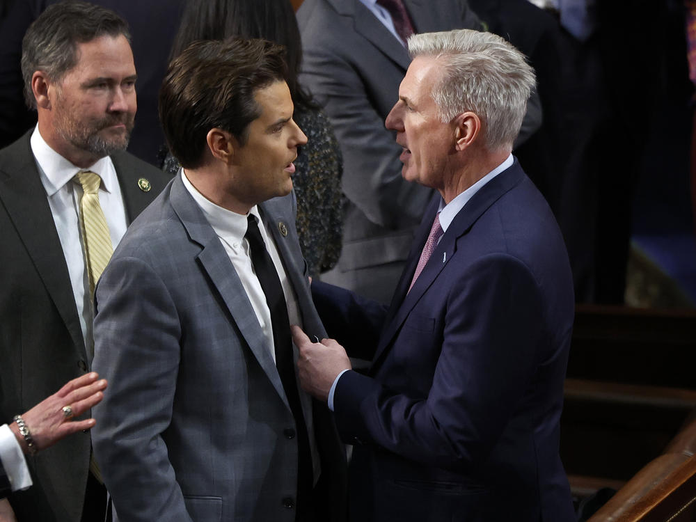 U.S. House Republican Leader Kevin McCarthy talks to then-Rep.-elect Matt Gaetz, R-Fla., in the House Chamber during the fourth day of voting for speaker of the House in January.