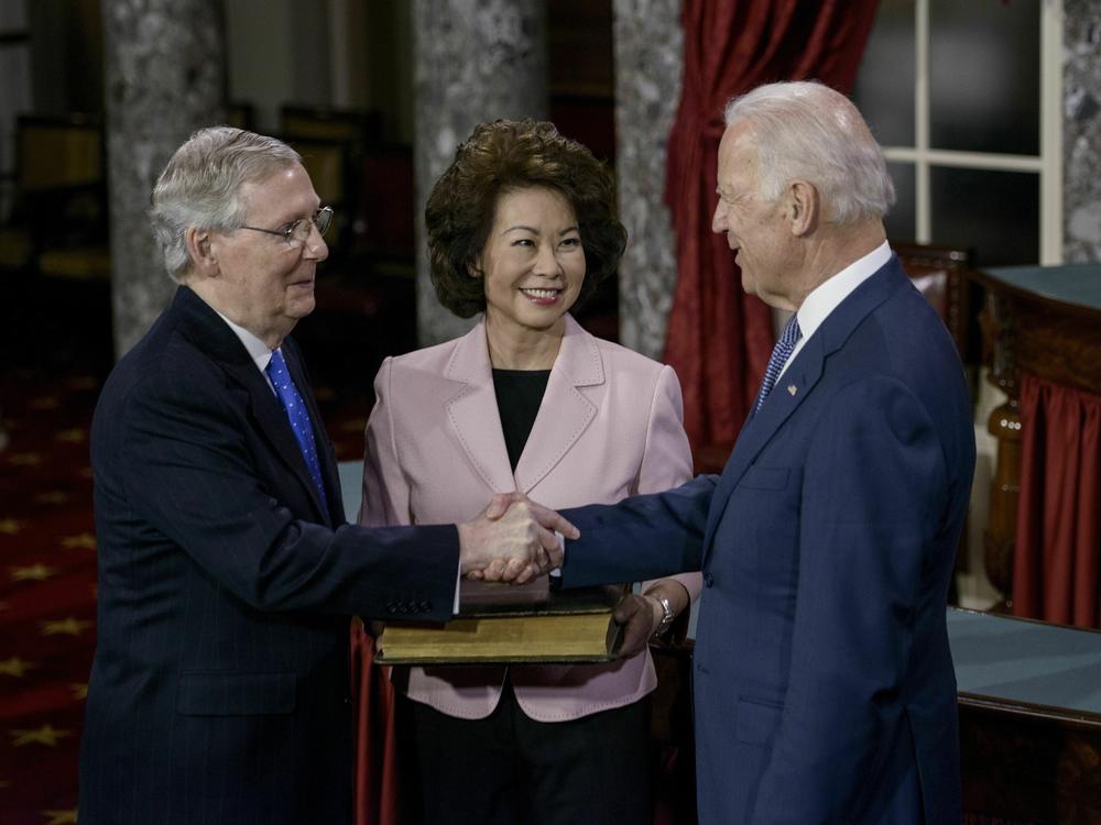 President Biden and Leader McConnell have known each other for decades. In this 2015 file photo, Biden — then vice president — and McConnell participated in a ceremonial swearing-in.
