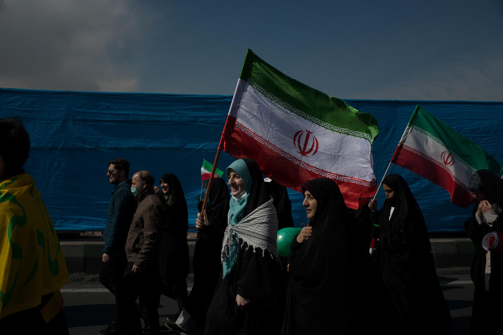 Iranian women join the celebrations marking Revolution Day in Tehran.
