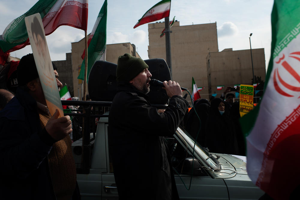 A man chants anti-U.S. and anti-Israeli slogans in Tehran.