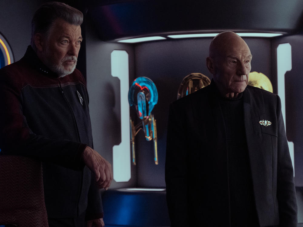 Jonathan Frakes as Will Riker and Patrick Stewart as Jean-Luc Picard.