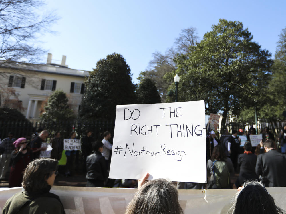 Protestors rally against then-Virginia Gov. Ralph Northam outside of the governor's mansion in Richmond, Va., on Feb. 4, 2019.