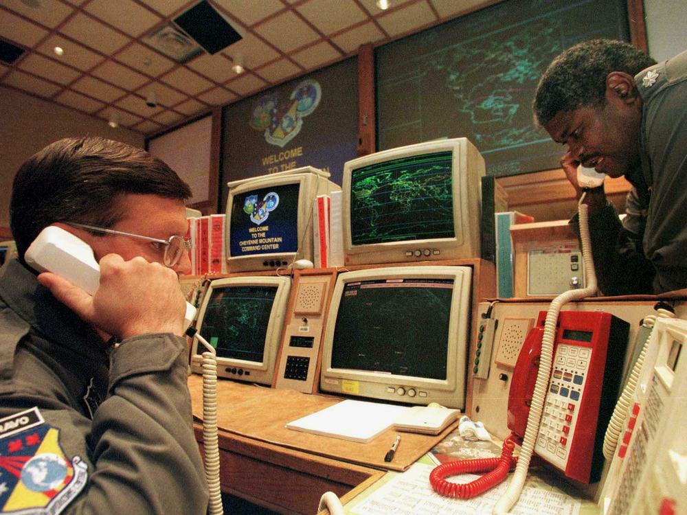 NORAD's leaders say it needs to modernize its systems, including a radar network that dates to the 1970s. In this 1999 photo, missile commanders confirm a launch warning during a practice drill at NORAD's operations center in the Cheyenne Mountain Complex in Colorado.