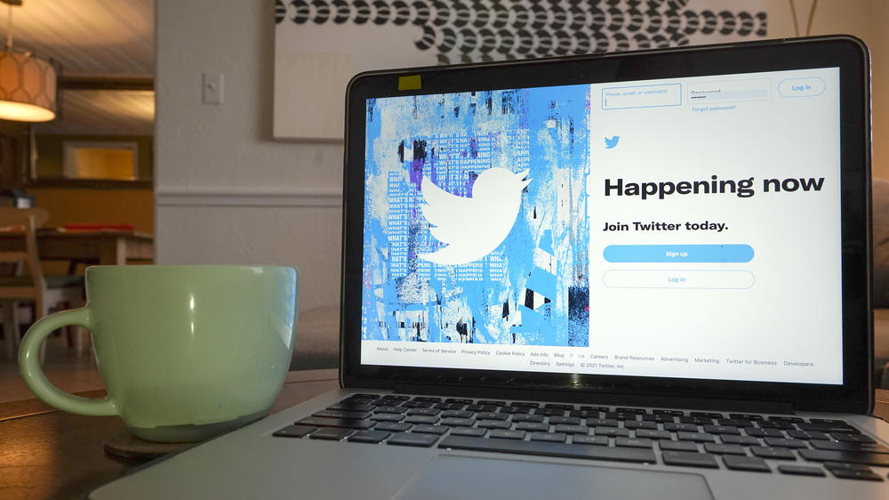 The login/sign up screen for a Twitter account is seen on a laptop computer on April 27, 2021, in Orlando, Fla. Proposed security changes for Twitter users who don't pay a monthly fee have stoked anger among many of the platform's users.