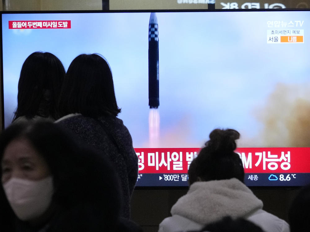 A TV screen shows a file image of North Korea's missile launch during a news program at a railway station in Seoul, South Korea, on Saturday.