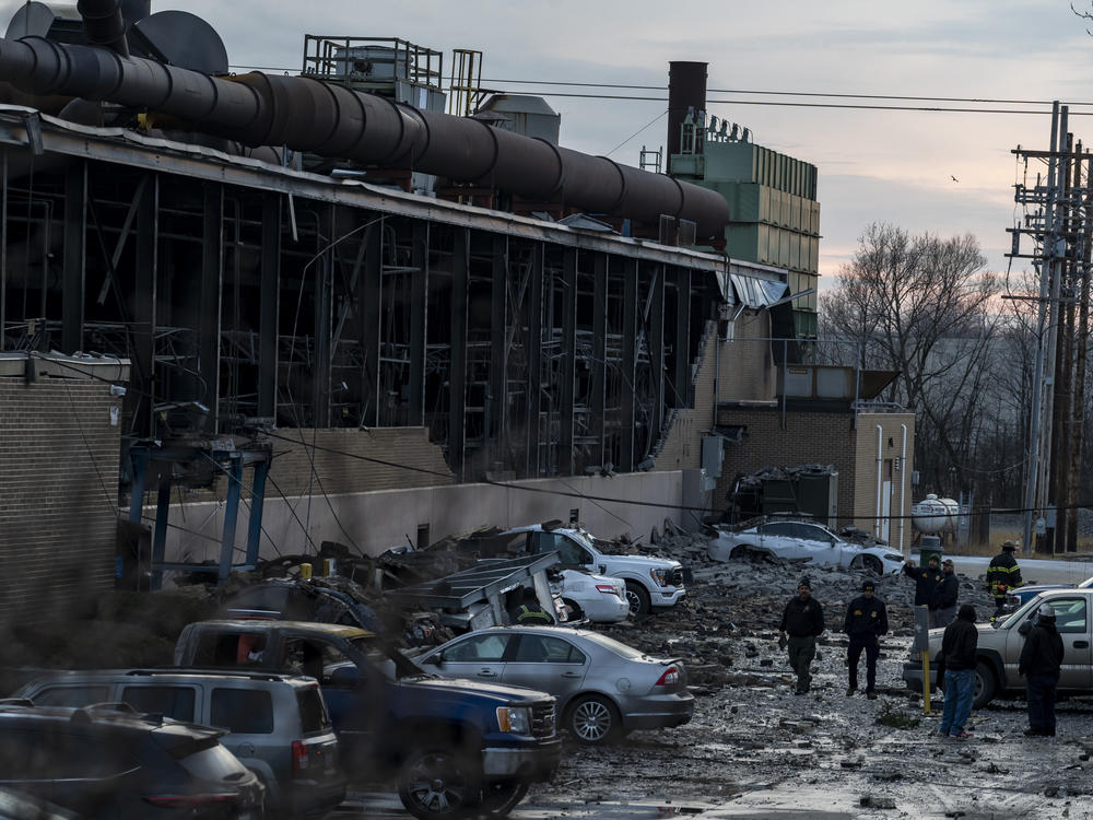Debris covers the ground and nearby cars after an explosion at the I. Schumann & Co. metals plant sent several victims to hospitals on Monday in Bedford, Ohio.