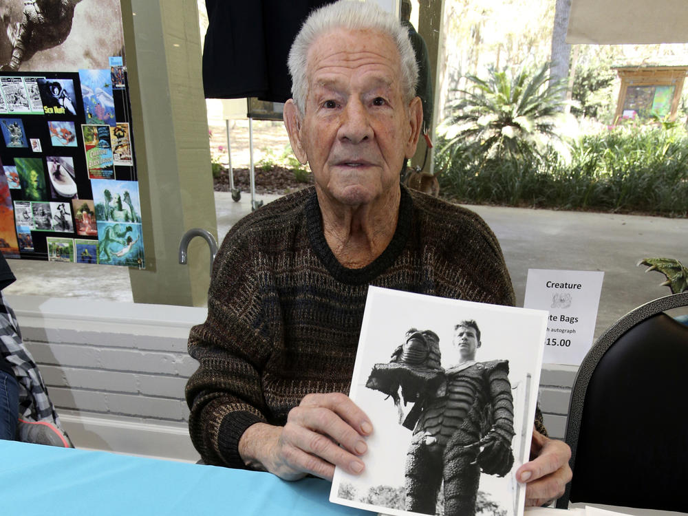 Ricou Browning, who played the creature in <em>Creature from the Black Lagoon</em>, poses for photos for people during Florida SpringsFest at Silver Springs State Park in Silver Springs, Fla., Sunday, March 4, 2018.