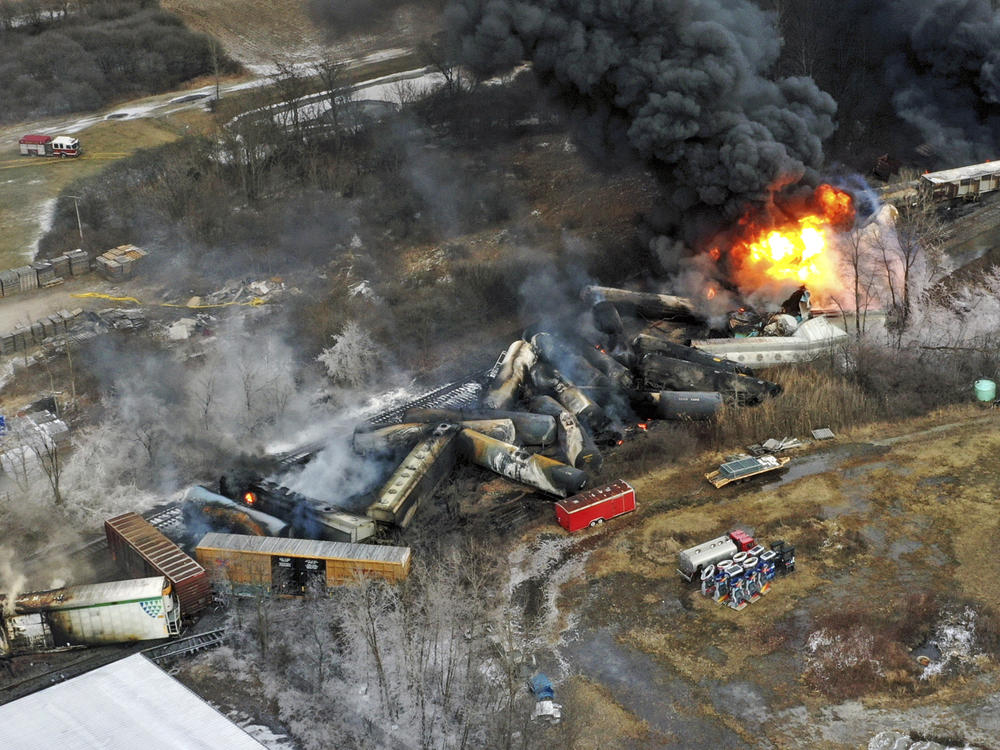 Portions of a Norfolk Southern freight train remained on fire Feb. 4 after derailing the previous day in East Palestine, Ohio.
