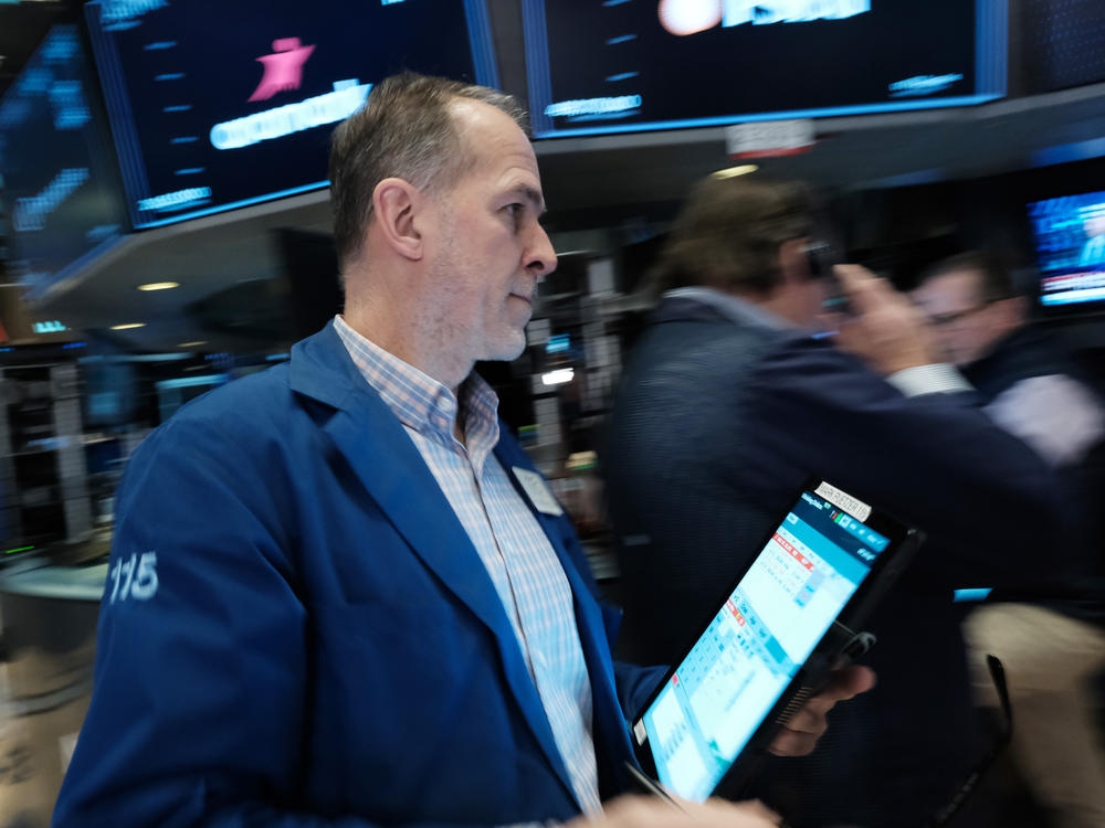 Traders work on the floor during morning trading at the New York Stock Exchange (NYSE) in New York City on March 10, 2023. Bank shares slumped on Monday despite U.S. regulator action to protect deposits at Silicon Valley Bank and Signature Bank.