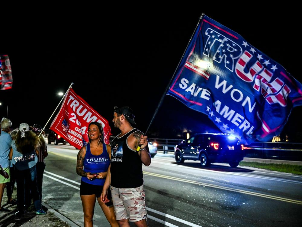 Supporters of former US President Donald Trump protest near the Mar-a-Lago Club in Palm Beach, Florida, on March 30, 2023.