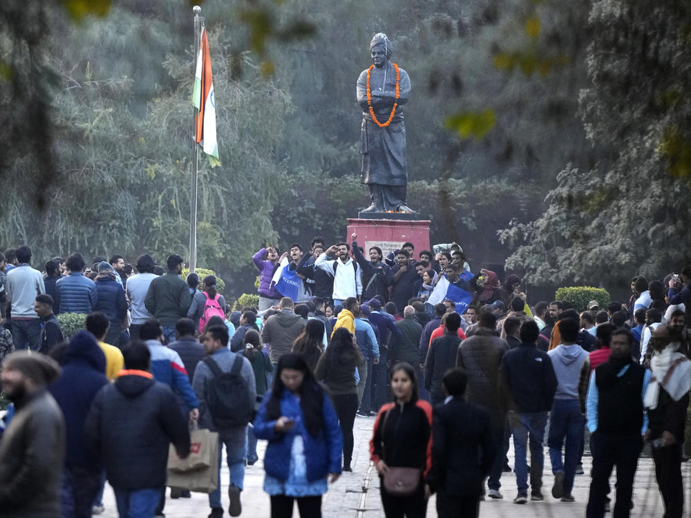 A group of students shout anti-government slogans as they are not allowed to screen a BBC documentary at Delhi University, Jan. 27. Tensions escalated at the university after a student group said it planned to screen the documentary examining Indian Prime Minister Narendra Modi's role during 2002 anti-Muslim violence, prompting dozens of police to gather outside campus gates.