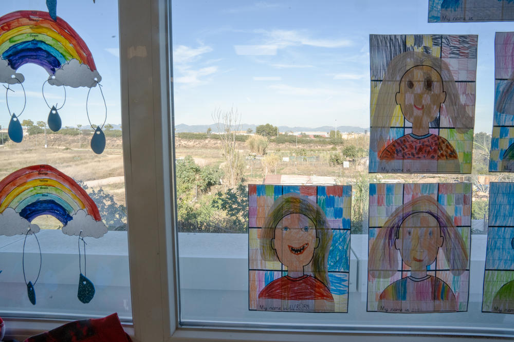 A self-portrait of Aurora Demchenko hangs on the window of her new first-grade classroom in Valencia, Spain.