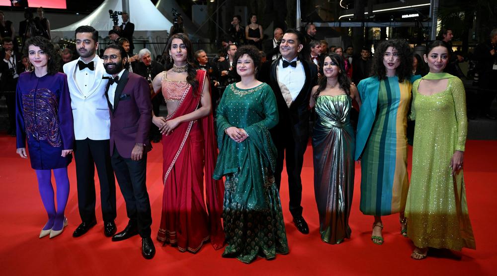 Rasti Farooq (from left), Saim Sadiq, Ali Junejo, Alina Khan,  Sania Saeed, Sarmad Khoosat, Apoorva Charan, Sana Jafri and Sarwat Gilani arrive for the screening of the film <em>Joyland</em> at the 75th edition of the Cannes Film Festival on May 22, 2022.