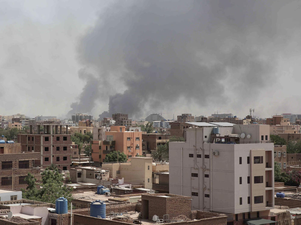 Smoke is seen rising from Khartoum's skyline on Sunday. The Sudanese military and a powerful paramilitary group battled for control of the chaos-stricken nation, signaling they were unwilling to end hostilities despite mounting diplomatic pressure to cease fire.