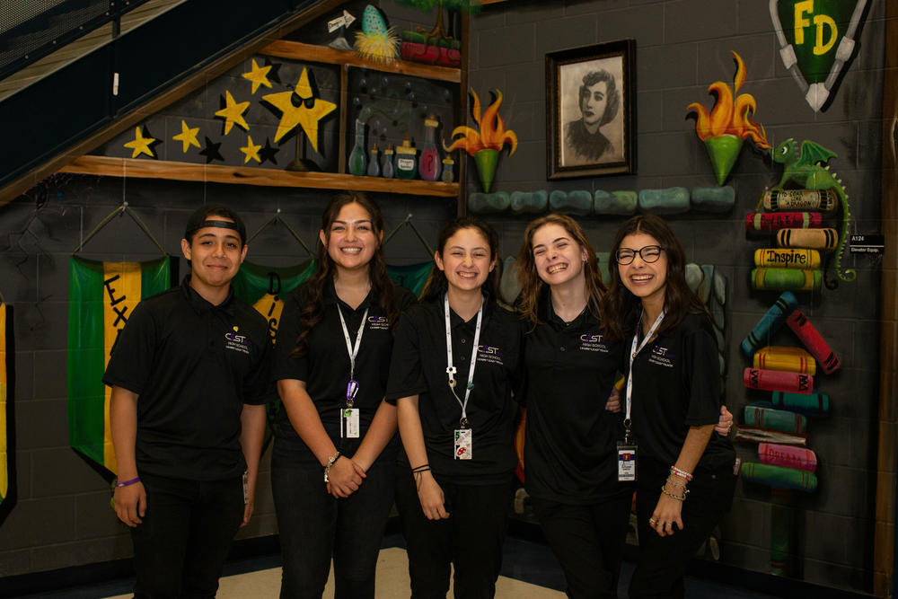 CAST Teach students (from left) Christopher Olivarez, Isabel Tate, Samantha Lopez, Heather Faulkner and Jayanne Garza stand for a portrait in the Forester Elementary atrium in February.