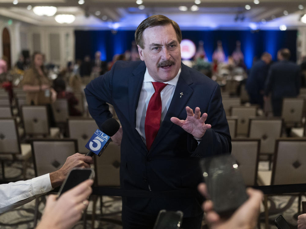 MyPillow chief executive Mike Lindell talks to reporters at the Republican National Committee winter meeting in Dana Point, Calif., on Jan. 27.