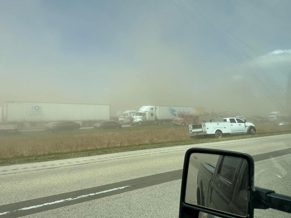 A view of vehicles in a dust storm that cut visibility to near zero and triggered a series of chain-reaction crashes  on a highway in Springfield, Ill.