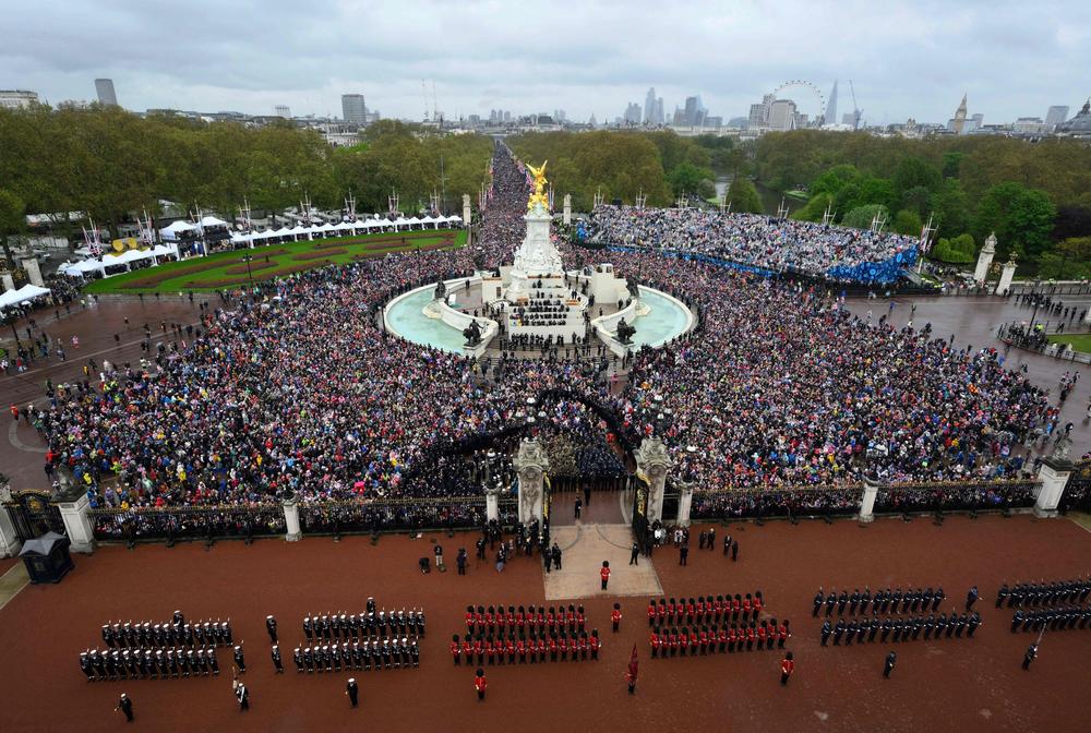 Crowds gather outside Buckingham Palace to view the Royal Air Force fly-past in central London.