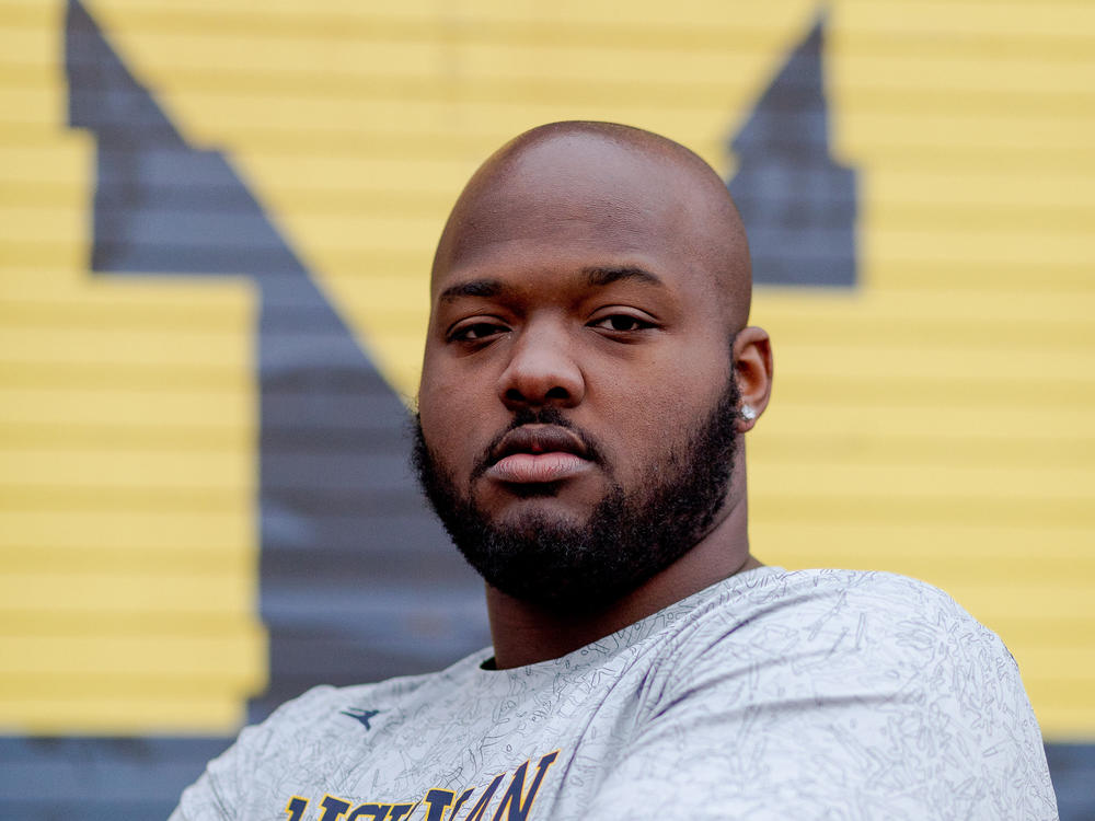 Football player Myles Hinton used the NCAA's college transfer portal to transfer from Stanford University to the University of Michigan in his effort to seek a path from college to the NFL.