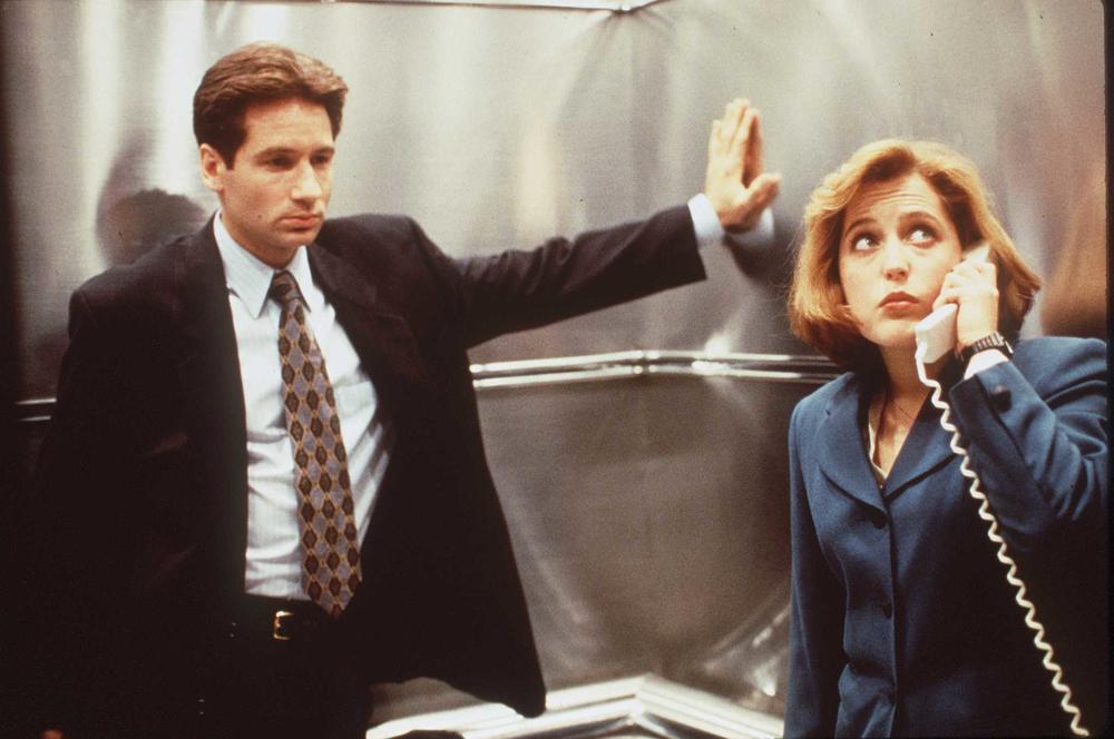 Some shows like <em>The X-Files</em> are high-concept, puzzle box series — intentionally packed full of secrets and hidden connections for viewers to untangle. Meanwhile, other shows just ... aren't. Above, Fox Mulder (David Duchovny) and Dana Scully (Gillian Anderson) in <em>The X-Files.</em>
