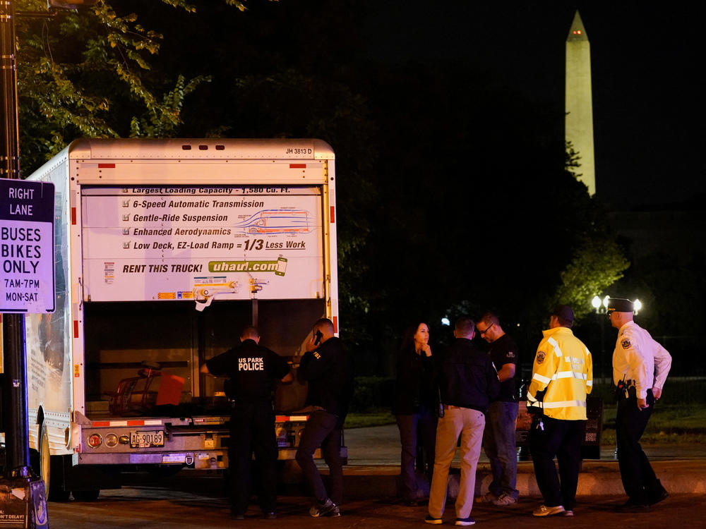 The U.S. Secret Service and other law enforcement agencies investigate a rented box truck that crashed into security barriers at Lafayette Park across from the White House in Washington, D.C., on Monday.
