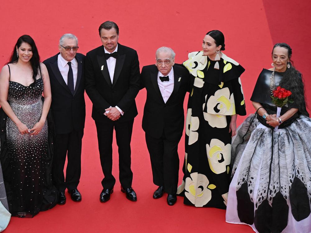 Jillian Dion, from left, JaNae Collins, Cara Jade Myers, Robert De Niro, Leonardo DiCaprio, Martin Scorsese, Lily Gladstone and Tantoo Cardinal arrive for the screening of <em>Killers of the Flower Moon</em> during the Cannes Film Festival in France, on May 20. On and off the red carpet, the festival had a strong Indigenous presence — a fashion show featuring Indigenous designers was a highlight.