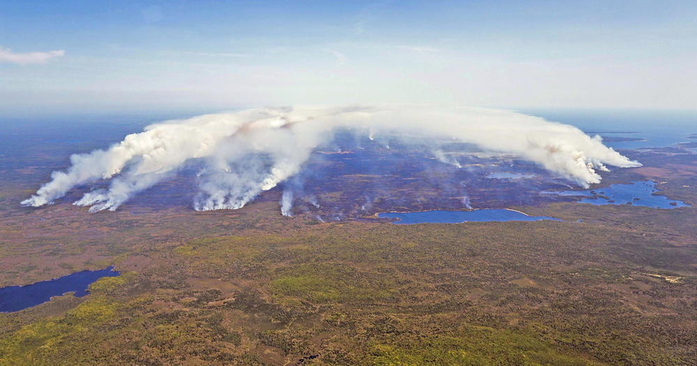In this aerial image, wildfires burn in Shelburne County, Nova Scotia, on Wednesday, May 31, 2023.