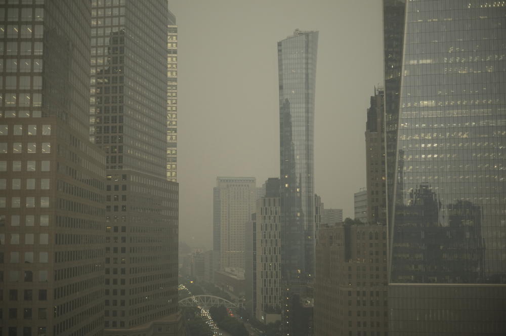 Buildings in lower Manhattan in New York are partially obscured by smoke from Canadian wildfires on Tuesday, June 6, 2023.