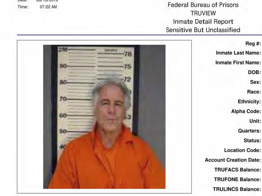 Lawsuits over big banks' role in Jeffrey Epstein's sex-trafficking ring have now secured hundreds of millions of dollars in settlements. Here, a photo shows a Federal Bureau of Prisons page for Epstein, part of a trove of documents obtained by the Associated Press this month.