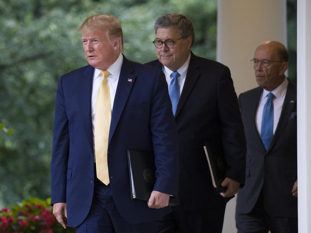 President Donald Trump and Attorney General William Barr (with Commerce Secretary Wilbur Ross) at the White House on July 11, 2019.