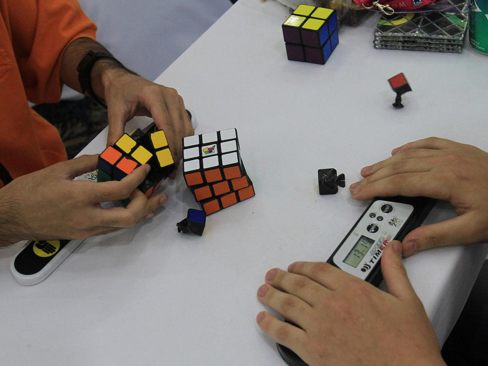 A contestant is seen before the start of the World Rubik's Cube Championship 2011 in Bangkok.