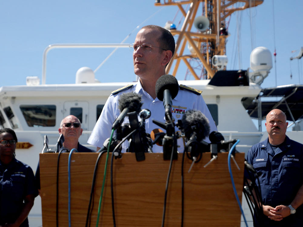 Rear Adm. John Mauger, the U.S. Coast Guard District commander, speaks during a news conference in Boston on Thursday about the search for the missing OceanGate submersible Titan.