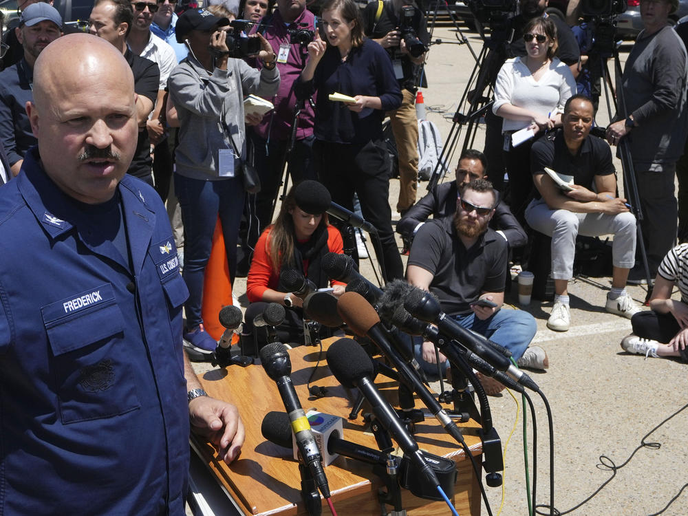 U.S. Coast Guard Capt. Jamie Frederick faces reporters Wednesday during a news conference at Coast Guard Base Boston.