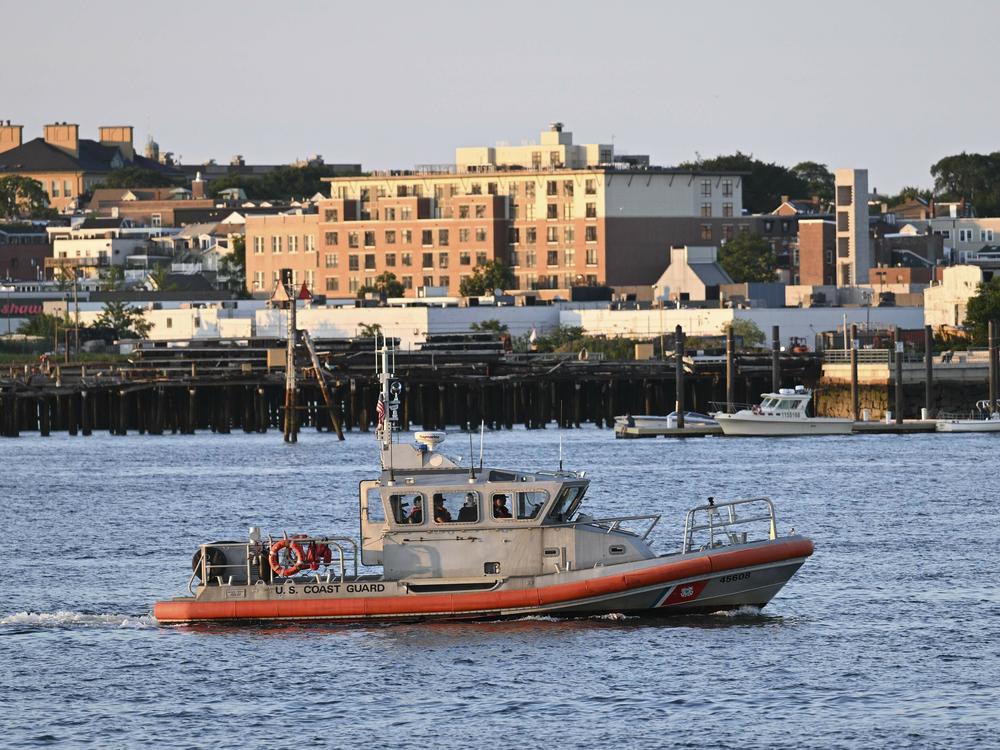 A boat near the U.S. Coast Guard base in Boston, Mass., on Wednesday, where rescue teams raced to find a missing submersible with five people on board.