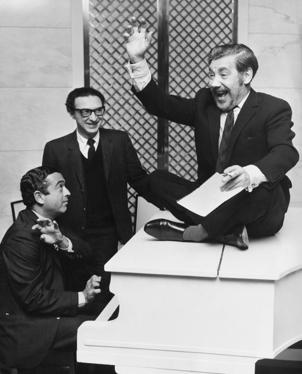 Sheldon Harnick, center, with Jerry Bock, left, and actor Alfie Bass in London after it was announced that Bock would take over the role of Tevye in <em>Fiddler on the Roof</em> in October 1967.