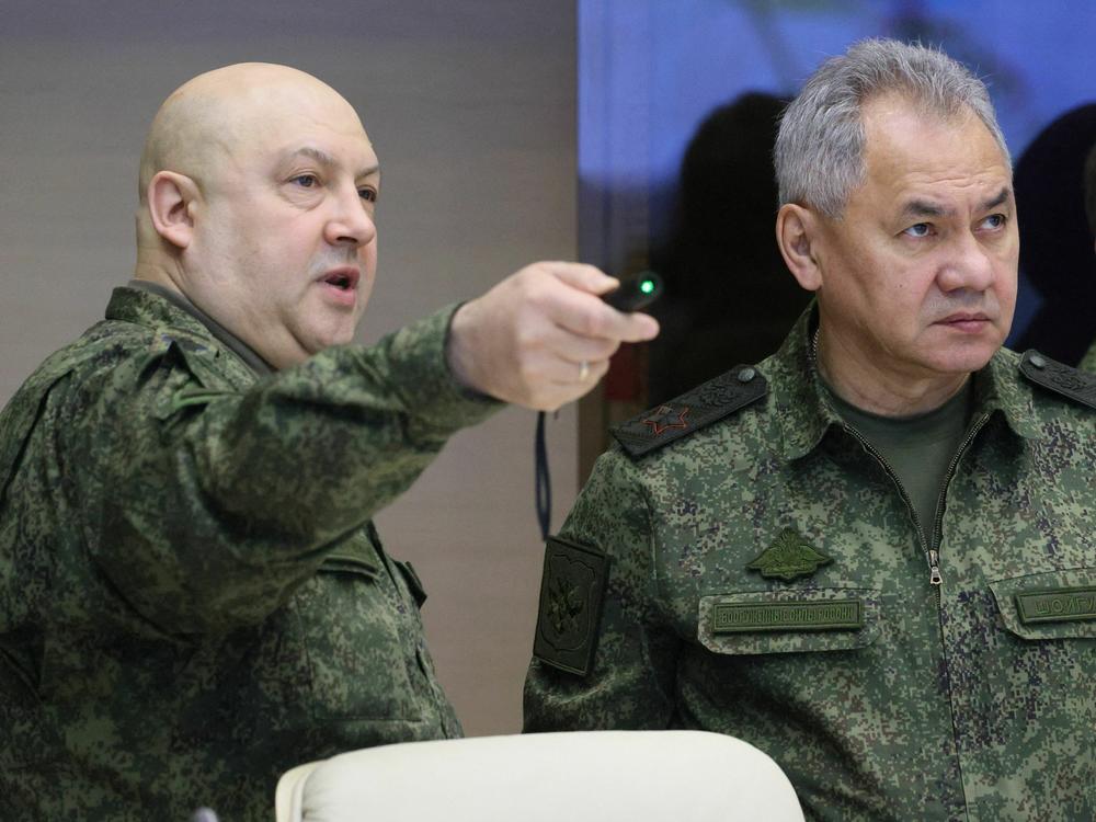 Gen. Sergei Surovikin (left), the former commander of Russia's military operation in Ukraine, has been detained. He's seen here last December alongside Russian Defense Minister Sergei Shoigu.