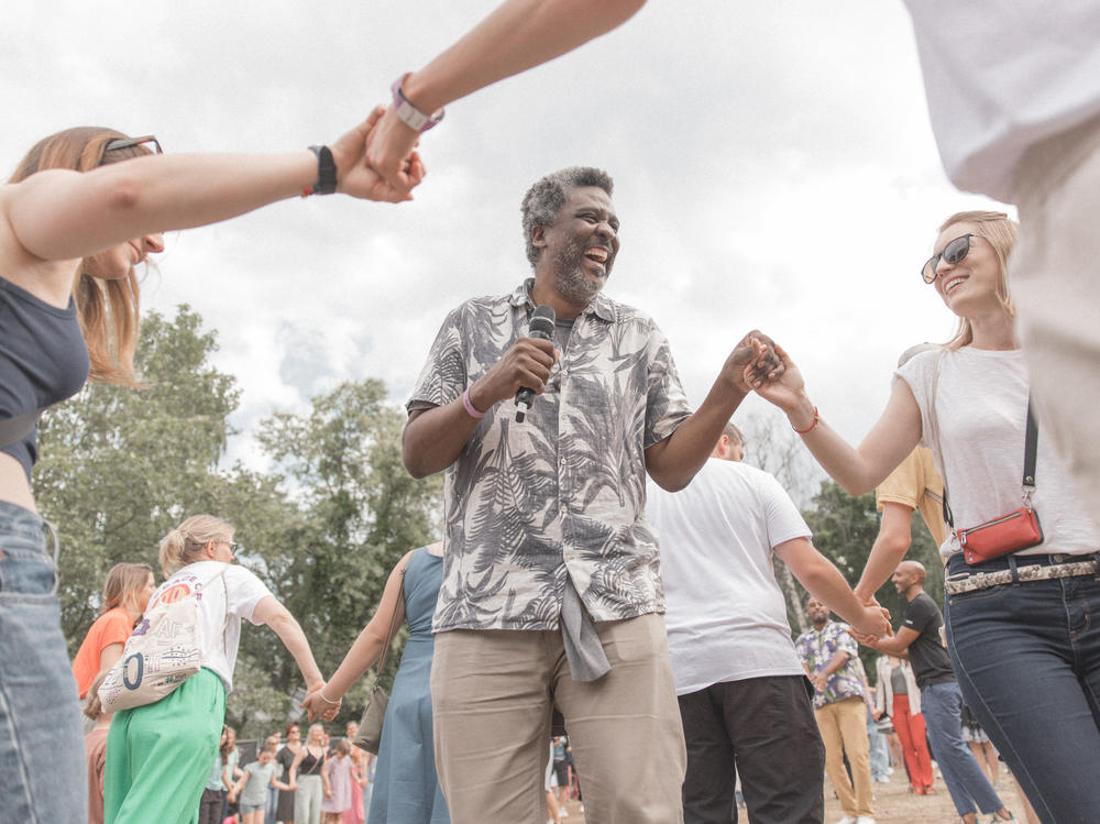 Edgard Gouveia at the PxP Festival in Berlin, where he organized a circle dance. He's a believer in the power of games and is currently developing a global game 