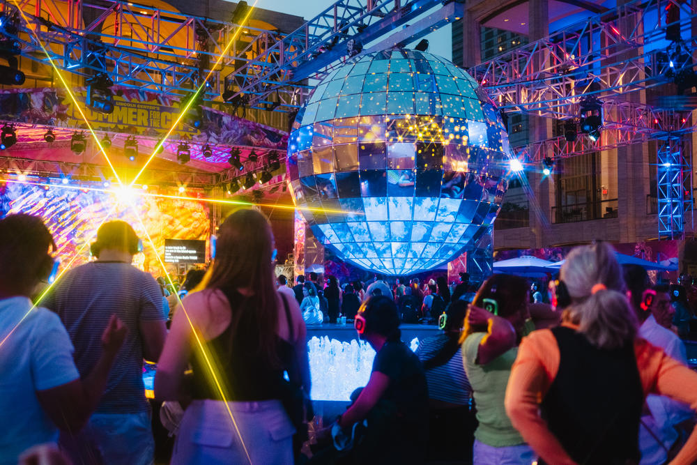 DJs, dancers, spectacular lighting and screens with captioning were on display at the Silent Disco dance party at Lincoln Center, New York City, on Saturday, July 1, 2023.
